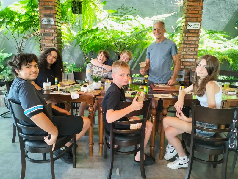 Students building cardboard toys at a workshop