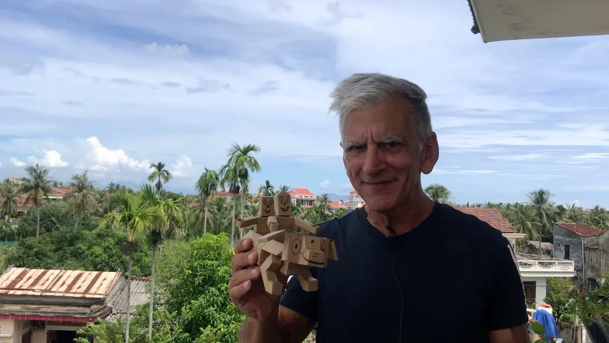 Tom Bast helping students